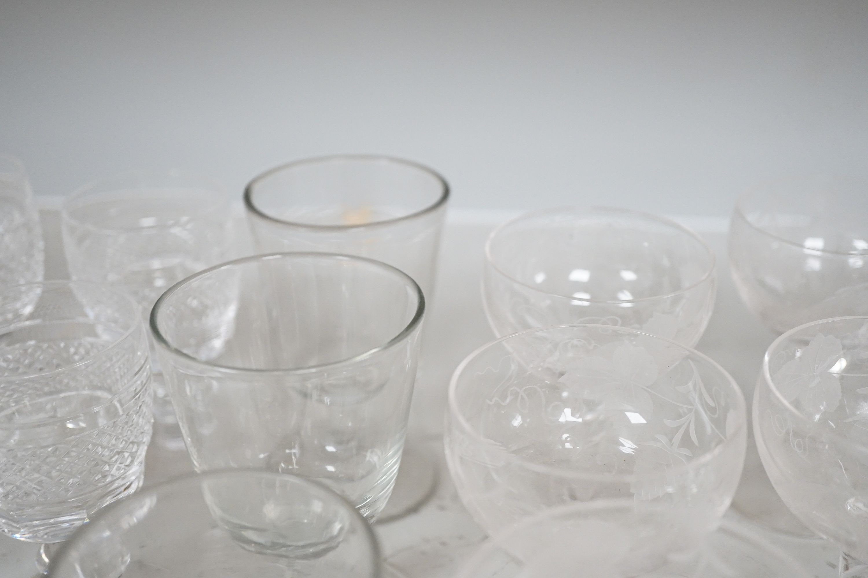 A collection of various suites of 20th century glassware to include a large etched glass